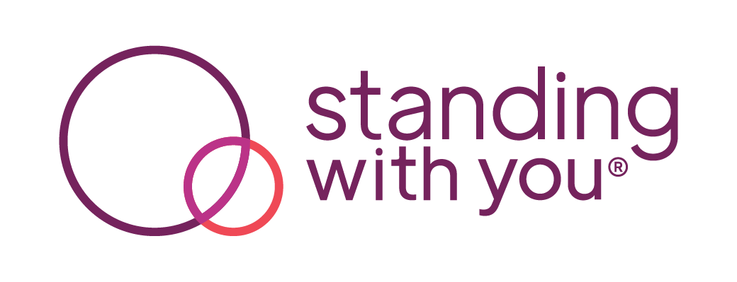 Logo that contains an image on the left of two circles intersecting and text on the right that reads, "standing with you"